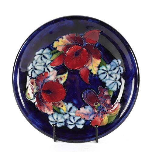 A MOORCROFT 'ORCHID' PATTERN DISH
