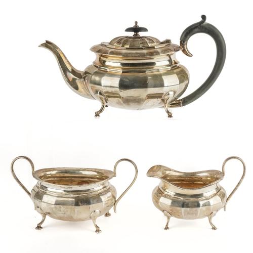 A SILVER THREE PIECE TEA SET (3)