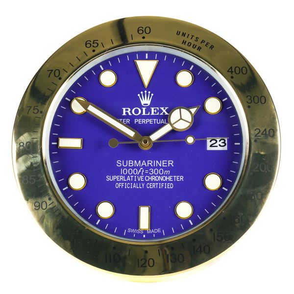 A METAL WALL CLOCK IN THE STYLE OF A ROLEX SUBMARINER