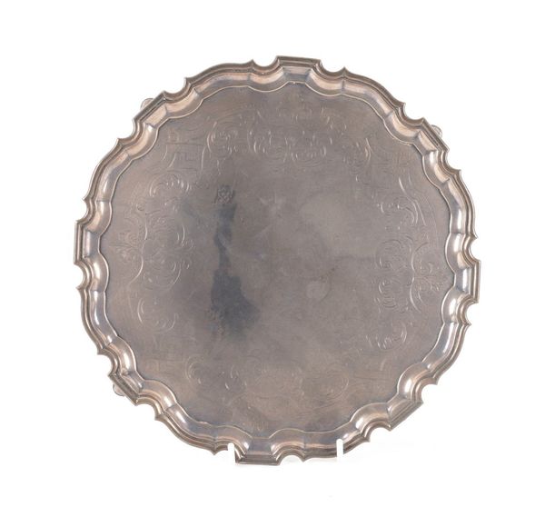 A SILVER SHAPED CIRCULAR SALVER