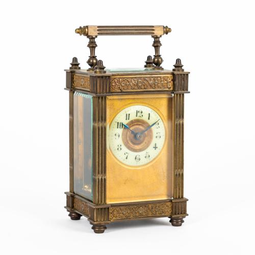 A FRENCH BRASS CARRIAGE TIMEPIECE