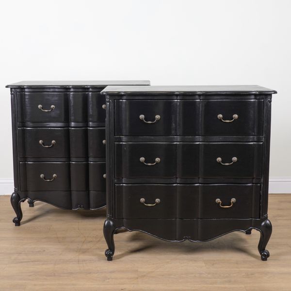 A PAIR OF BLACK PAINTED THREE DRAWER COMMODES
