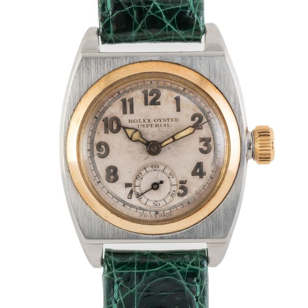 A ROLEX OYSTER IMPERIAL REF:1573 STEEL AND GOLD WATCH