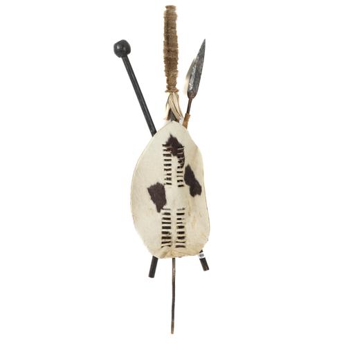 AN AFRICAN COW HIDE TRIBAL SHIELD AND SPEAR WALL HANGING DISPLAY