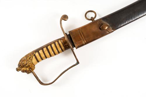 A BRITISH OFFICER’S SABRE WITH LION-HEAD POMMEL