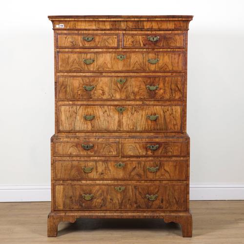 A GEORGE II EBONY BANDED FIGURED WALNUT CHEST ON CHEST