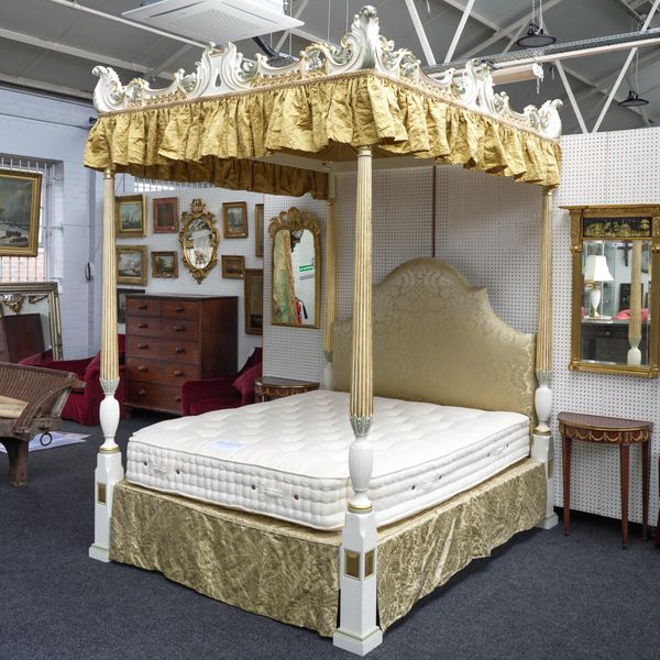 A MODERN WHITE PAINTED PARCEL GILT DECORATED FOUR POSTER BED