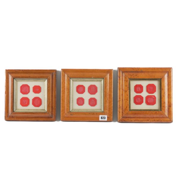 THREE FRAMED SETS OF WAX SEALS (3)