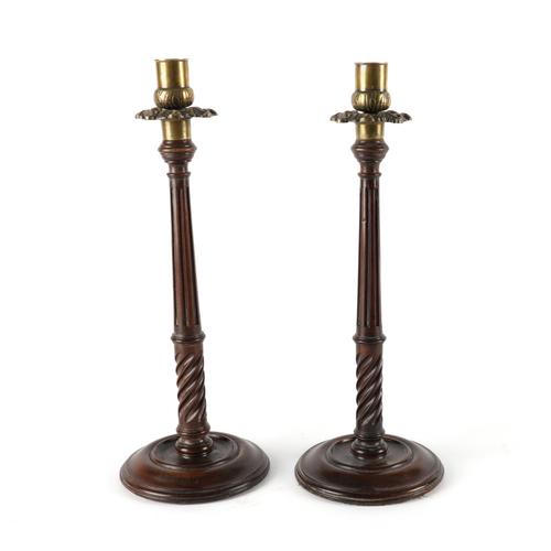 A PAIR OF GEORGE III STYLE MAHOGANY AND BRASS CANDLESTICKS (2)
