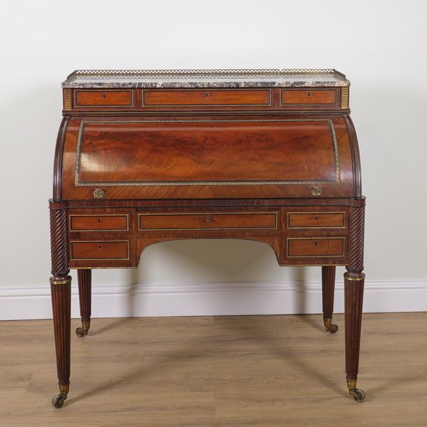 A REGENCY GILT METAL MOUNTED MARBLE TOPPED FREESTANDING CYLINDER BUREAU