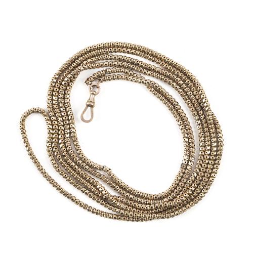 A LATE VICTORIAN GOLD LONG GUARD MUFF CHAIN