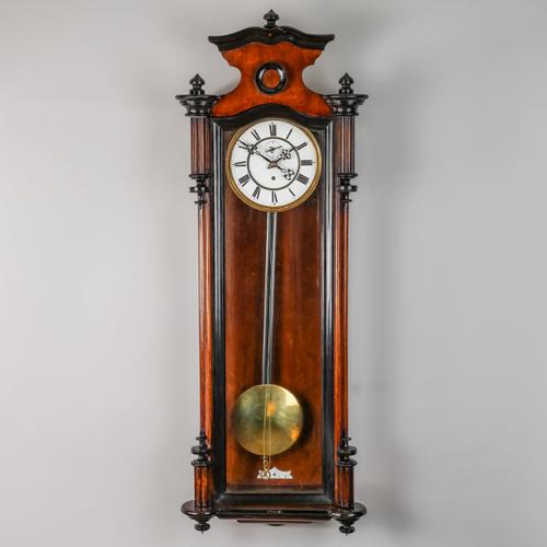 A WALNUT, EBONISED AND STAINED WOOD VIENNA TIMEPIECE