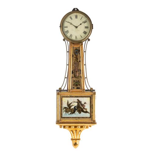 AN AMERICAN GILTWOOD MAHOGANY AND VERRE ÉGLIOMISÉ BANJO WALL TIMEPIECE