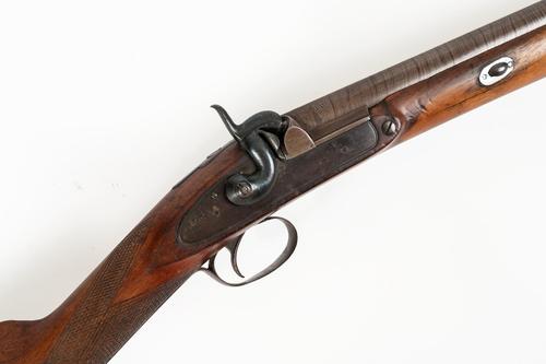 A PERCUSSION SPORTING GUN WITH DAMASCUS BARREL