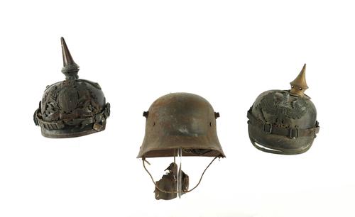 TWO GERMAN WORLD WAR ONE HELMETS AND ANOTHER (3)