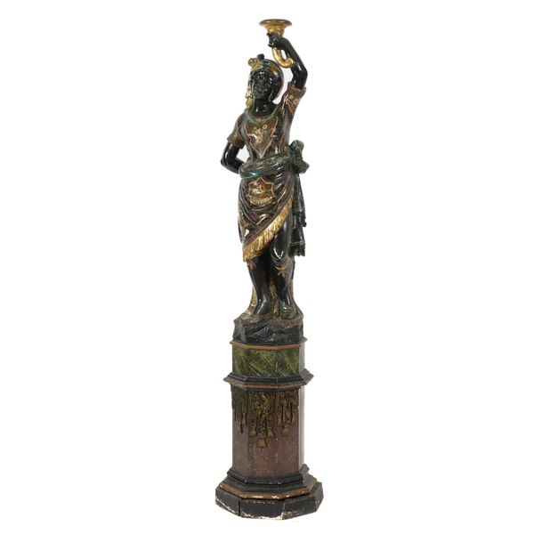 AN EARLY 20TH CENTURY EBONISED AND POLYCHROME PAINTED MOORISH FIGURAL JARDINIERE