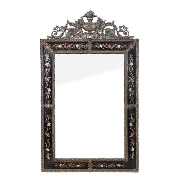 A LATE 19TH CENTURY FRENCH GILT METAL MOUNTED CUSHION FRAMED WALL MIRROR