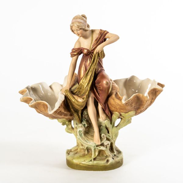 ROYAL DUX; A FIGURE OF A LADY WITH A CONCH SHELL