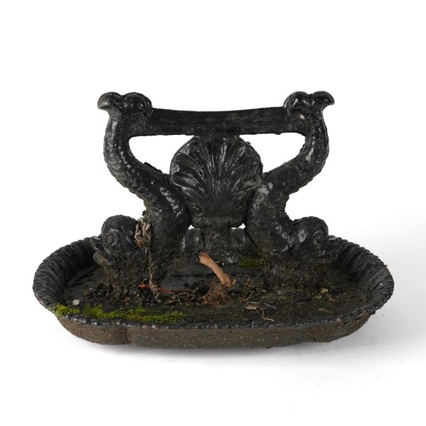 A VICTORIAN BLACK PAINTED CAST-IRON BOOT SCRAPPER