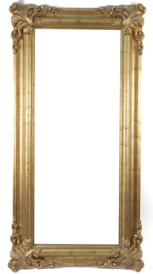A REGENCY STYLE GITLT FRAMED RECTANGULAR WALL MIRROR