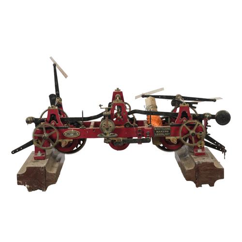 A QUARTER CHIMING AND STRIKING TURRET CLOCK WITH CHEVRON-SHAPED DIAL