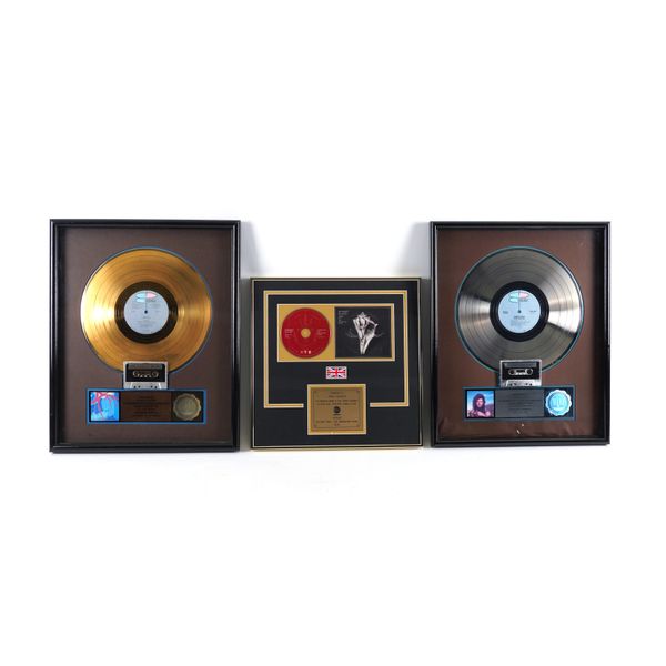 THREE ROBERT PLANT GOLD AND PLATINUM DISC AWARDS (3)