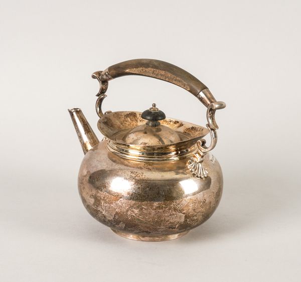 A SILVER TEAPOT