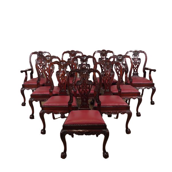 A SET OF TEN GEORGE II STYLE CARVED MAHOGANY DINING CHAIRS (10)