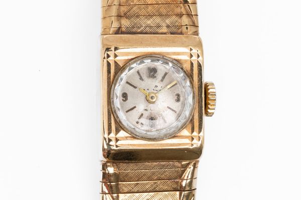 A GOLD WRISTWATCH