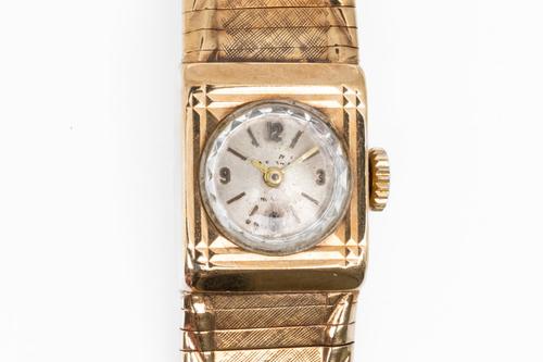 A GOLD WRISTWATCH