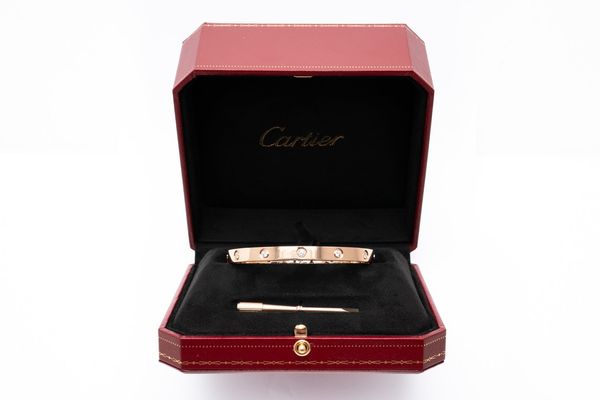 A ROSE GOLD CARTIER LOVE BANGLE, TEN DIAMONDS, BOXED (3)