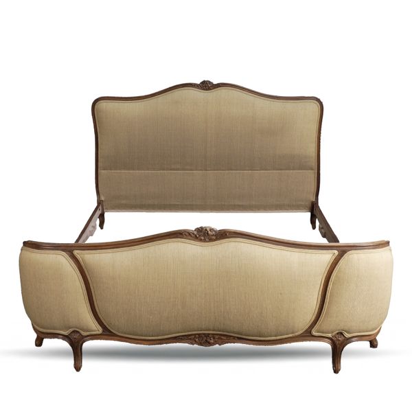 AN EARLY 20TH CENTURY FRENCH STAINED BEECH DOUBLE BED