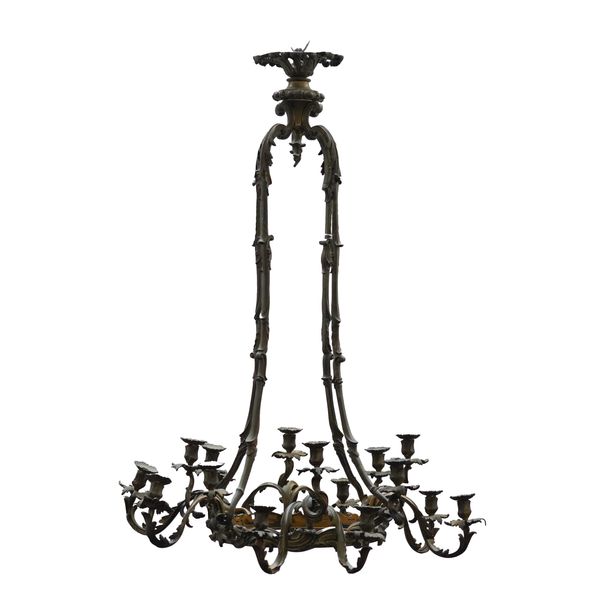 A LOUIS XV ROCOCO REVIVAL BRONZE TWELVE LIGHT CHANDELIER