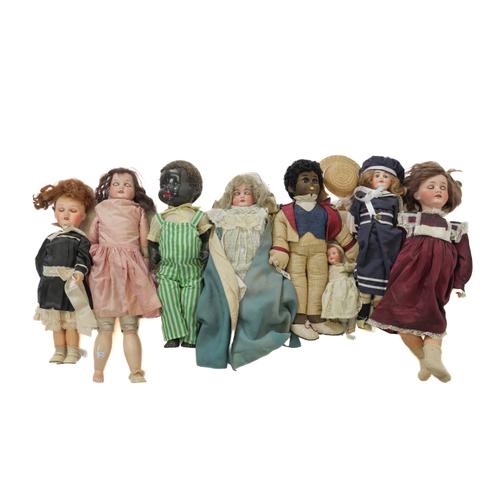 A GROUP OF EIGHT ANTIQUE AND VINTAGE DOLLS (8)