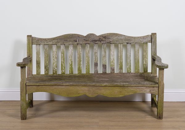 A SLATTED HARDWOOD GARDEN BENCH