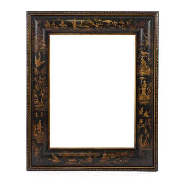 A BLACK LACQUER CHINOISERIE DECORATED CUSHION FRAMED WALL MIRROR
