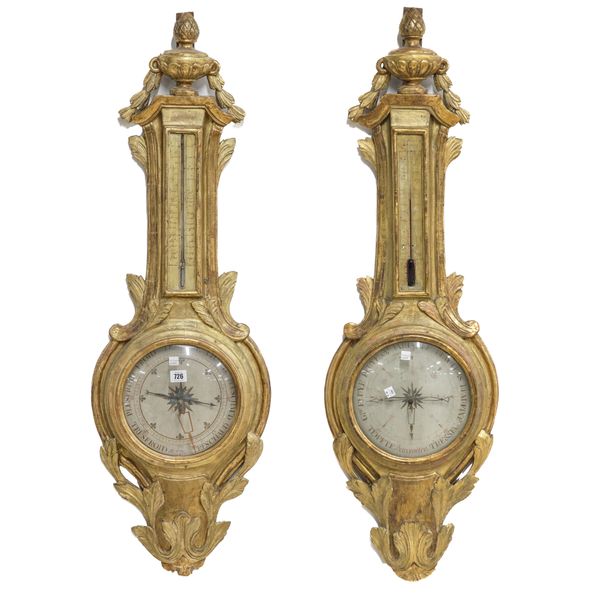 A VERY NEAR PAIR OF 19TH CENTURY AND LATER CONTINENTAL GILT BAROMETERS