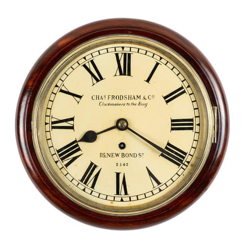 A 10IN. MAHOGANY DIAL CLOCK