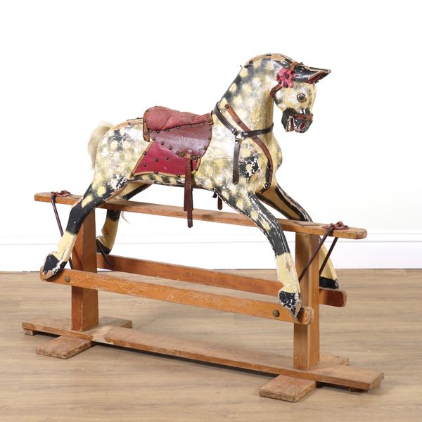 A MID 20TH CENTRY DAPPLE GREY ROCKING HORSE