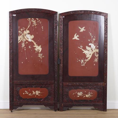 TWO EARLY 20TH CENTURY JAPANESE EXPORT CARVED HARDWOOD TWO FOLD SCREENS (4)