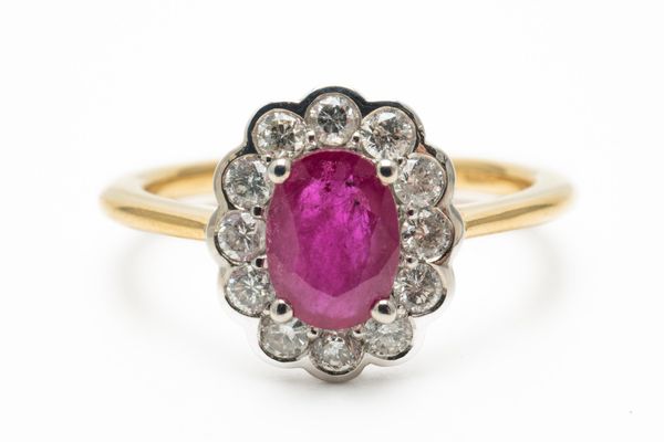 A RUBY AND DIAMOND FLORAL CLUSTER RING