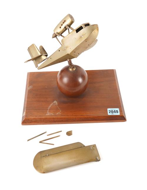 A MID 20TH CENTURY METAL MODEL OF AN AEROPLANE