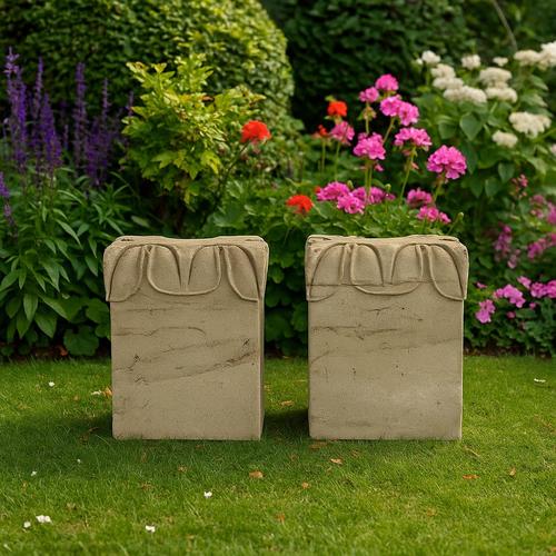 A PAIR OF CARVED STONE RECTANGULAR ARCHITECTURAL FRAGMENTS (2)