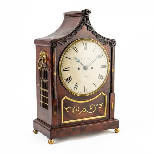 A LATE WILLIAM IV MAHOGANY AND CUT-BRASS INLAID STRIKING BRACKET CLOCK
