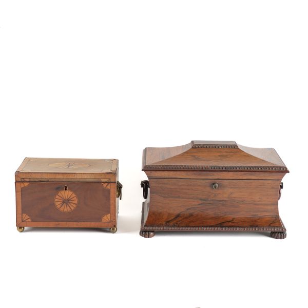 A REGENCY ROSEWOOD SARCOPHAGUS FORM TEA CADDY (2)