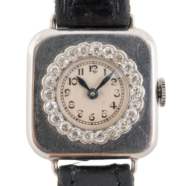 A LADY'S PLATINUM CASED AND DIAMOND SET SQUARE CASED DRESS WRISTWATCH