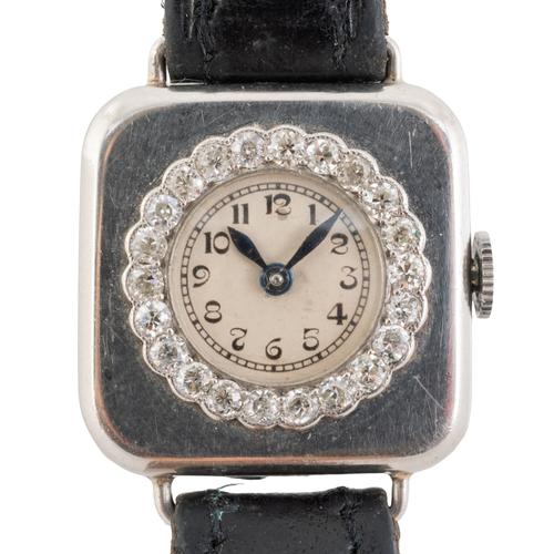 A LADY'S PLATINUM CASED AND DIAMOND SET SQUARE CASED DRESS WRISTWATCH