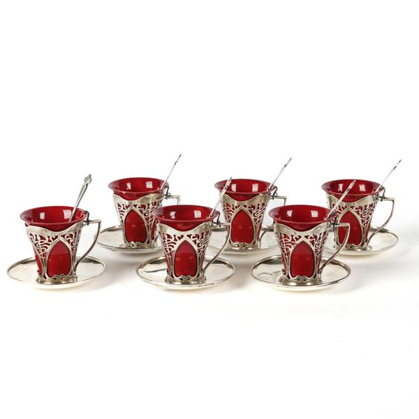 A SILVER AND ROYAL DOULTON FLAMBE CABERET SET (18)