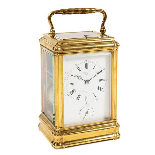 A FRENCH BRASS GORGE CASE PETITE SONNERIE STRIKING AND REPEATING CARRIAGE CLOCK