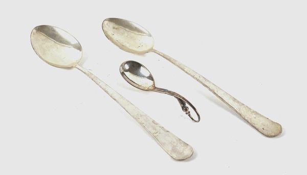 A PAIR OF SILVER STUFFING SPOONS AND A GEORG JENSEN STERLING SPOON (3)